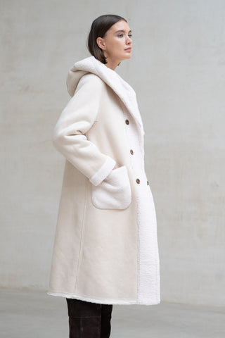 ABRIGO LARGO CAPUCHA REVERSIBLE CRUDO